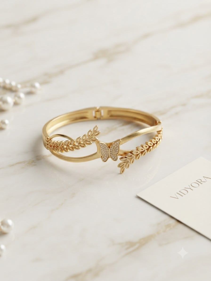 VIDYORA Golden Butterfly & Leaf Hinged Bangle