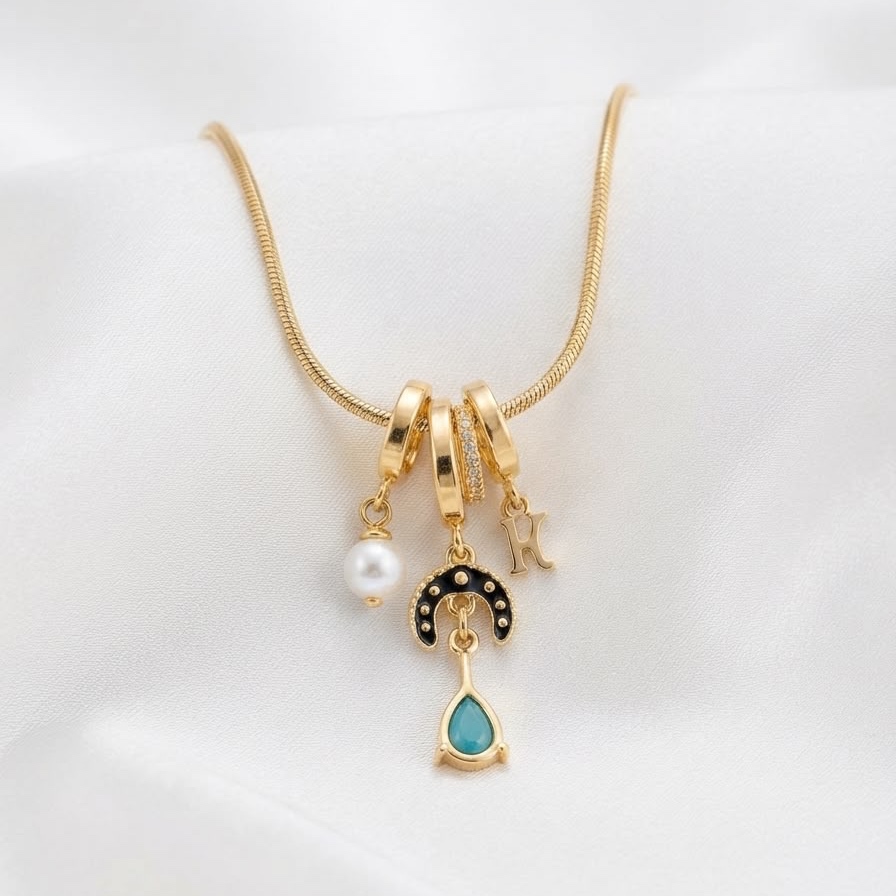 Gold-Toned Multi-Charm Pendant Necklace with Mint Green Drop & Pearl