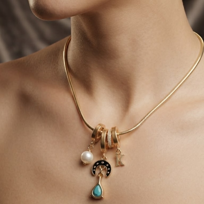 Gold-Toned Multi-Charm Pendant Necklace with Mint Green Drop & Pearl