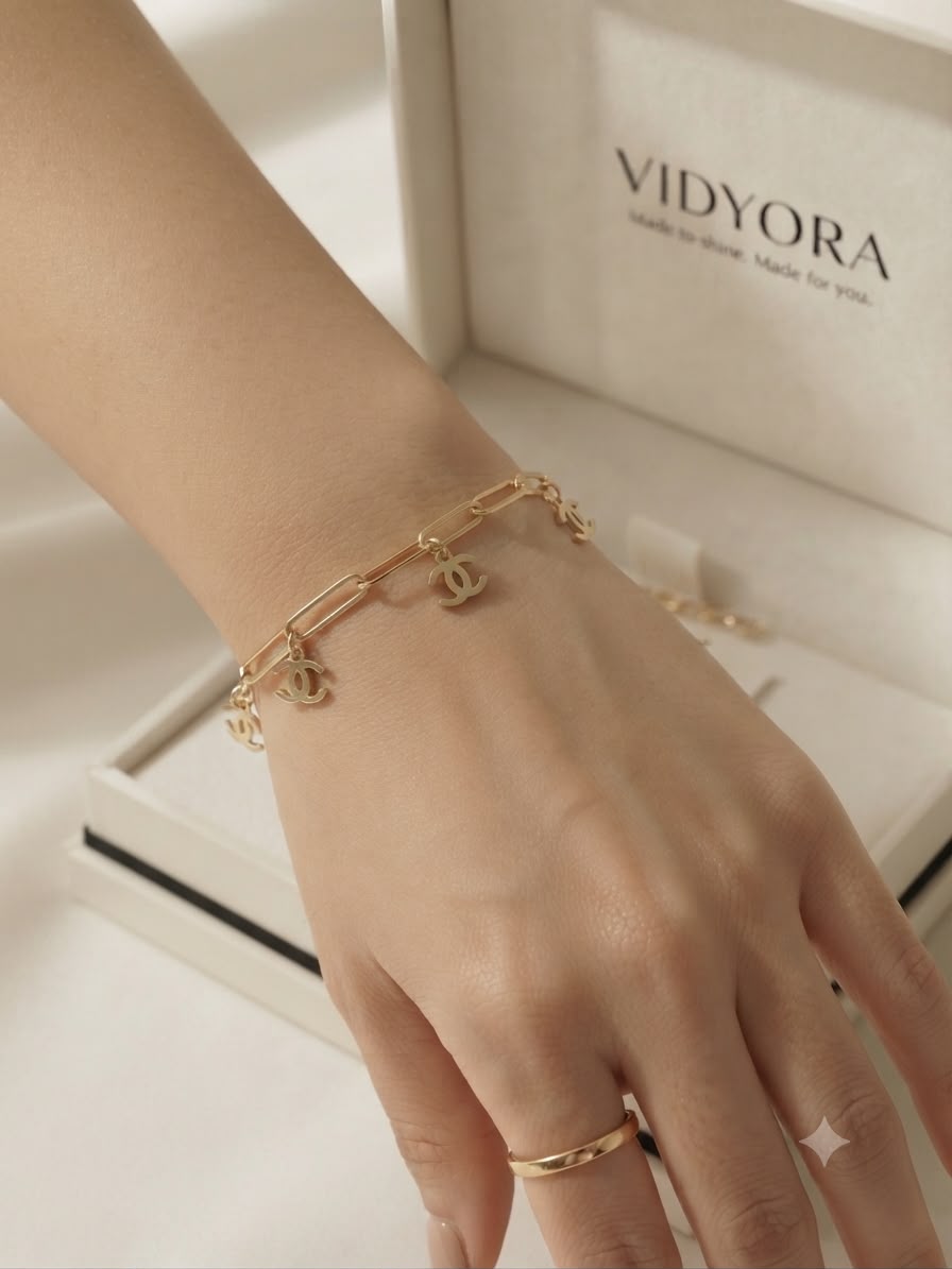 VIDYORA Golden Charm Link Bracelet
